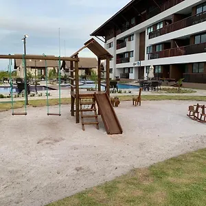 https://apartamento-cupe-beach.portodegalinhashotels.com